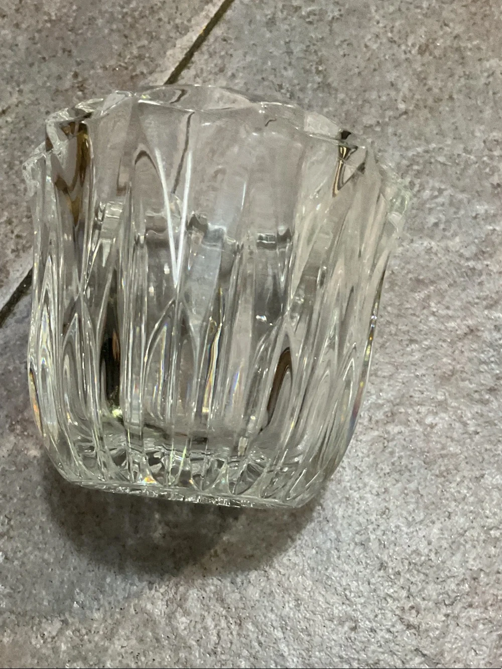 Brass candle holder with glass